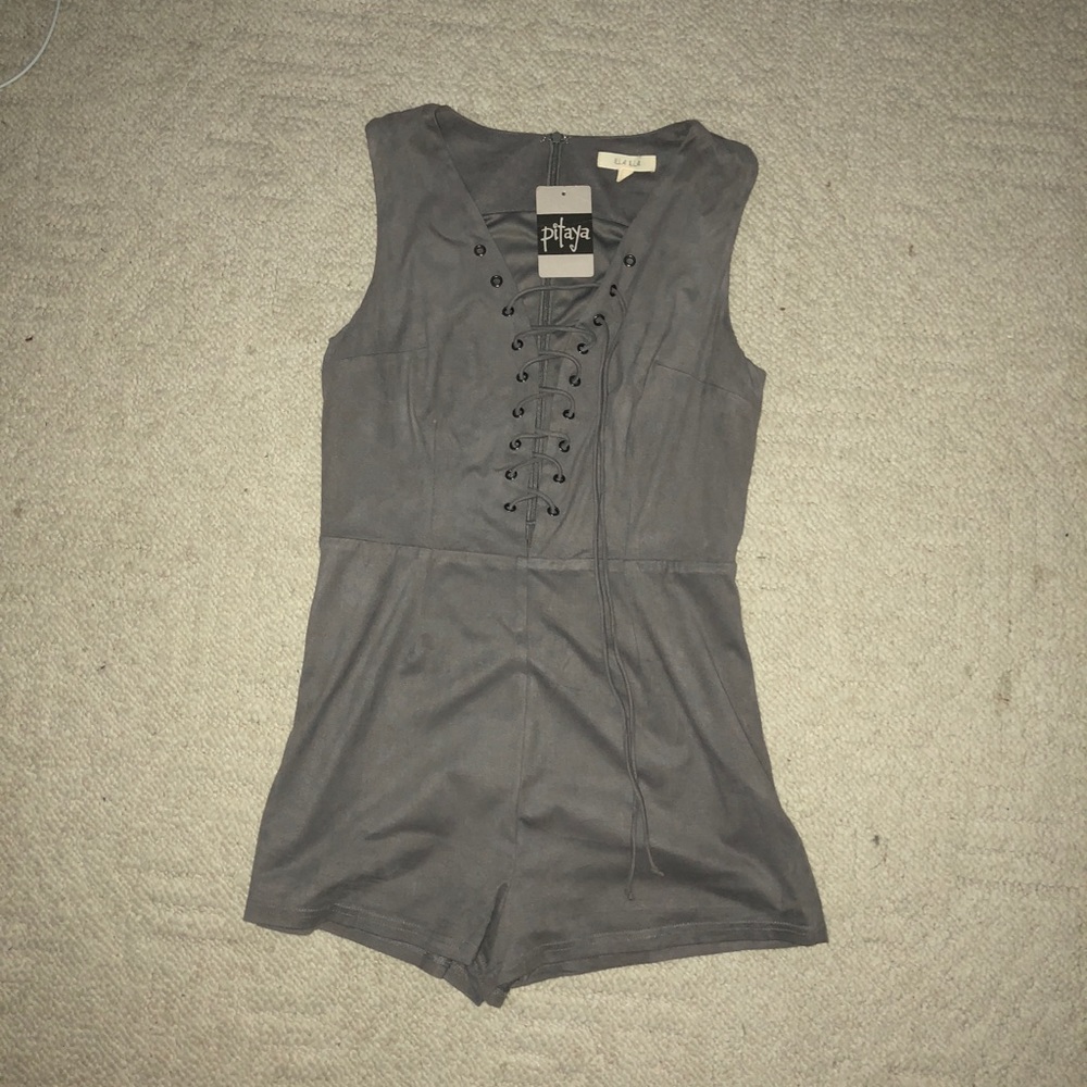 New with tags grey Pitaya romper in size medium